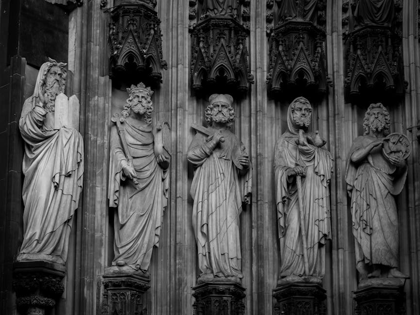 Cologne MICE events - Intricate black and white statues adorn the Cologne Cathedral's gothic facade. - Photo by The Daphne Lens